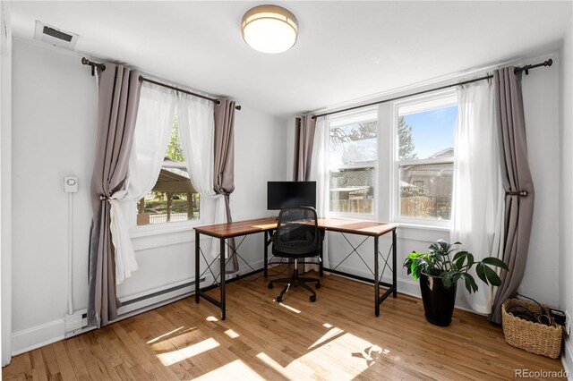 office area featuring wood finished floors and baseboards