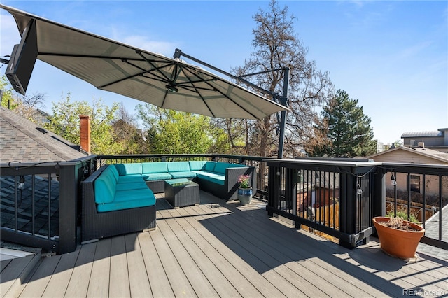 wooden deck featuring an outdoor hangout area