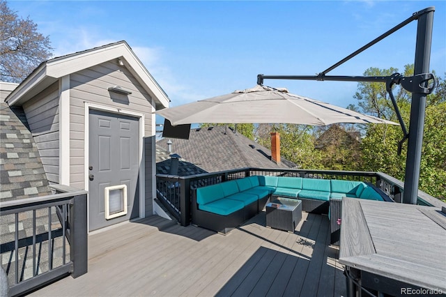 wooden deck with an outdoor hangout area