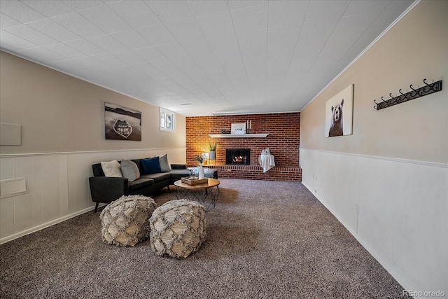 carpeted living room with a fireplace