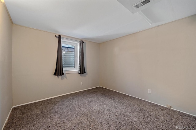 unfurnished room with carpet flooring