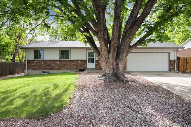7695 S Harlan St, Littleton, CO 80128 - ranch-style house with brick siding, an attached garage, and concrete driveway