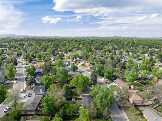 7695 S Harlan St, Littleton, CO 80128 - aerial perspective of suburban area with a heavily wooded area