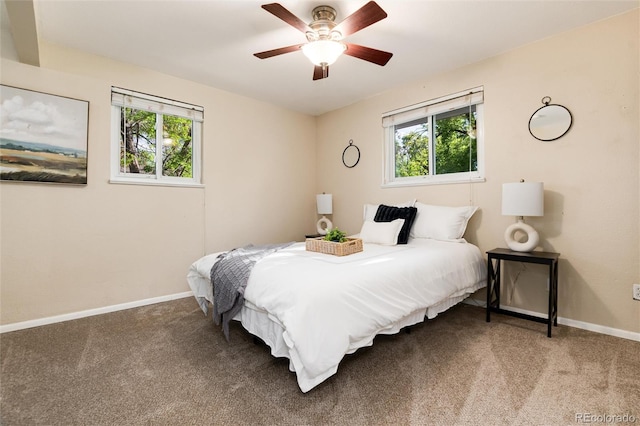 7695 S Harlan St, Littleton, CO 80128 - carpeted bedroom featuring baseboards and a ceiling fan