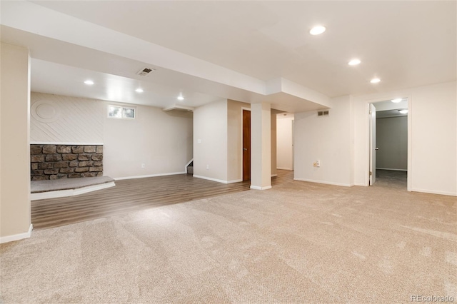 7695 S Harlan St, Littleton, CO 80128 - below grade area with carpet floors, baseboards, stairs, and recessed lighting