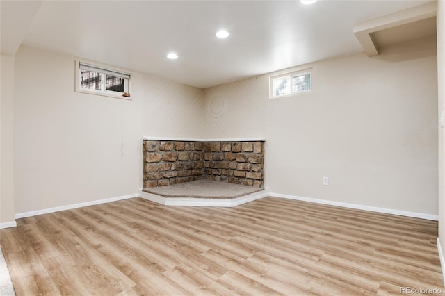 7695 S Harlan St, Littleton, CO 80128 - below grade area with wood finished floors, recessed lighting, and baseboards