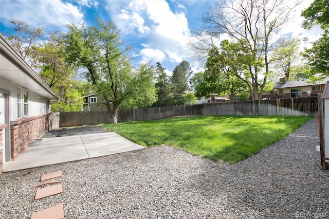 7695 S Harlan St, Littleton, CO 80128 - view of yard with a patio