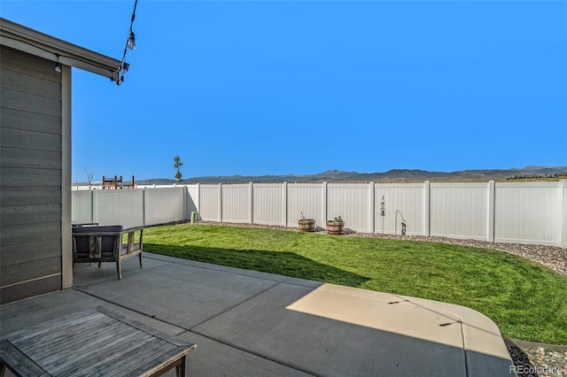 view of patio featuring a mountain view