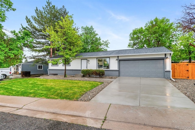 4672 S Lewiston Way, Aurora, CO 80015 - ranch-style house featuring an attached garage, driveway, and brick siding