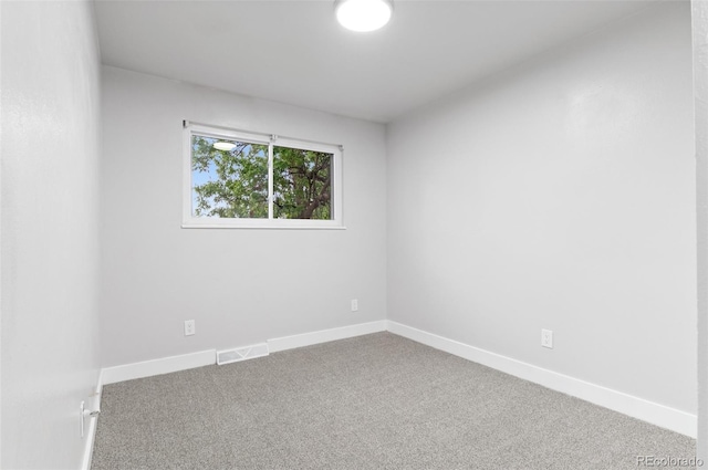 4672 S Lewiston Way, Aurora, CO 80015 - carpeted spare room with baseboards