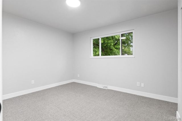 4672 S Lewiston Way, Aurora, CO 80015 - carpeted empty room with baseboards