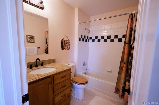 bathroom with toilet, tile patterned floors, shower / tub combo with curtain, and vanity