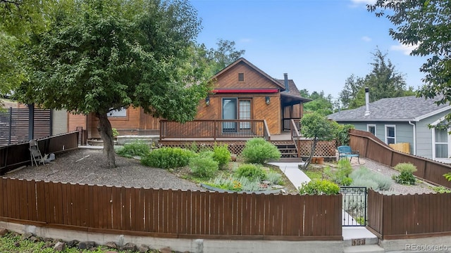 133 N 13th St, Colorado Springs, CO 80904 - rear view of property with a fenced front yard, a gate, and a porch