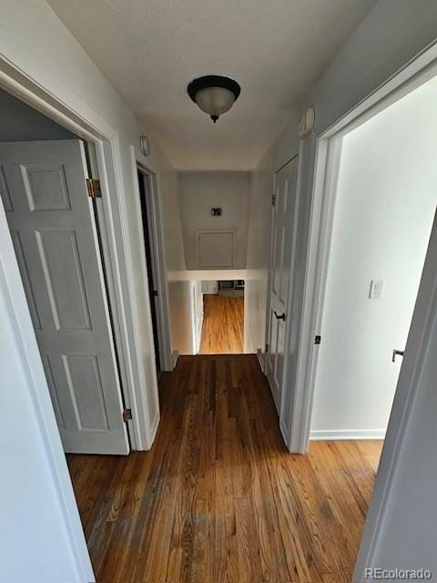 hall featuring dark hardwood / wood-style floors