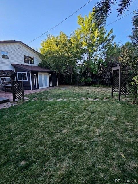 view of yard with a wooden deck