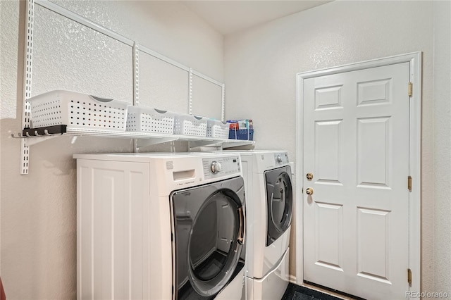 laundry room featuring laundry area and washing machine and dryer