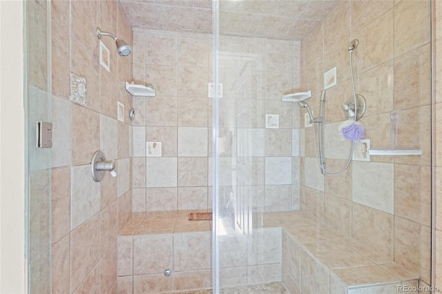 full bathroom featuring a stall shower