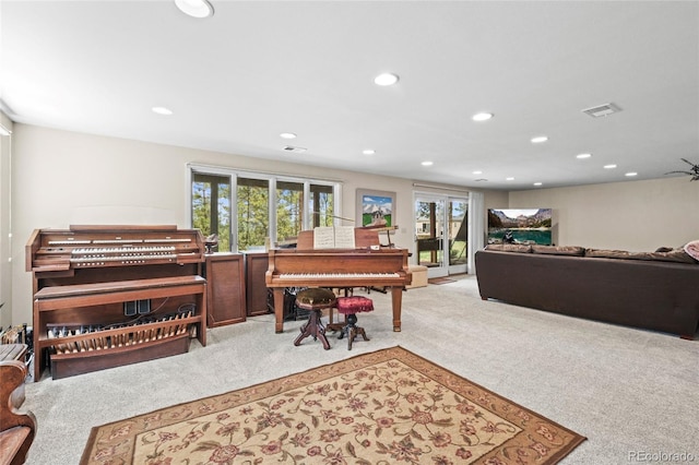 interior space with recessed lighting, carpet, and visible vents