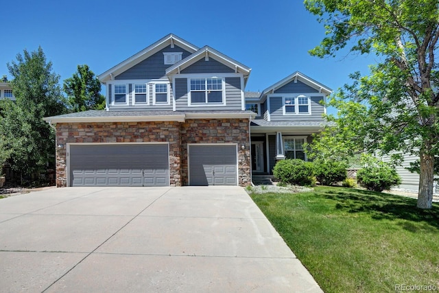 7329 Arco Iris Ln, Castle Pines, CO 80108 - craftsman inspired home featuring a garage, a front lawn, driveway, and stone siding