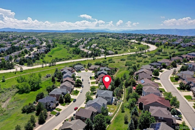 7329 Arco Iris Ln, Castle Pines, CO 80108 - aerial view of residential area featuring a mountainous background
