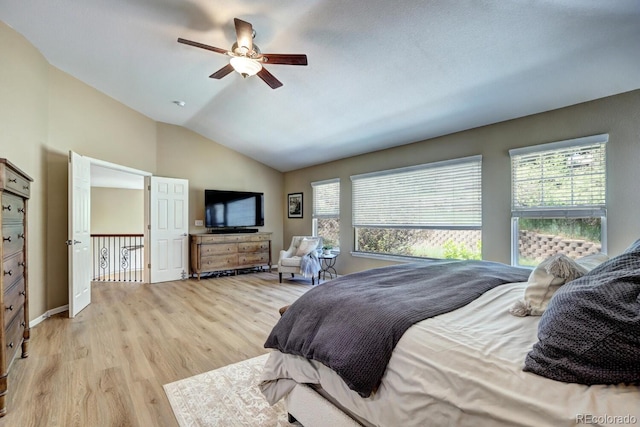 7329 Arco Iris Ln, Castle Pines, CO 80108 - bedroom featuring light wood-style floors, lofted ceiling, and ceiling fan