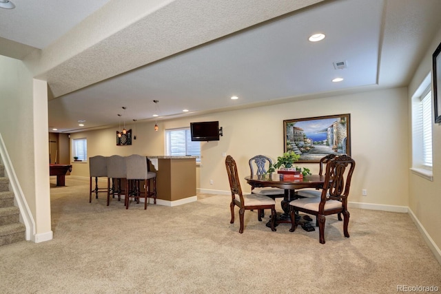 7329 Arco Iris Ln, Castle Pines, CO 80108 - dining room with light carpet, recessed lighting, healthy amount of natural light, stairway, and bar