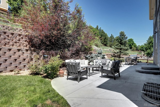 7329 Arco Iris Ln, Castle Pines, CO 80108 - view of patio / terrace with an outdoor hangout area and outdoor dining space