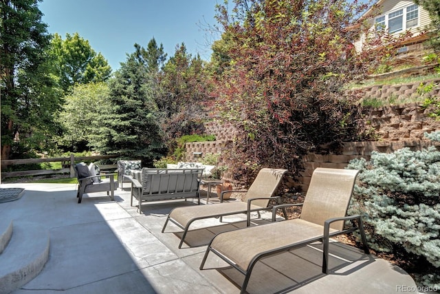 7329 Arco Iris Ln, Castle Pines, CO 80108 - view of patio / terrace featuring an outdoor hangout area
