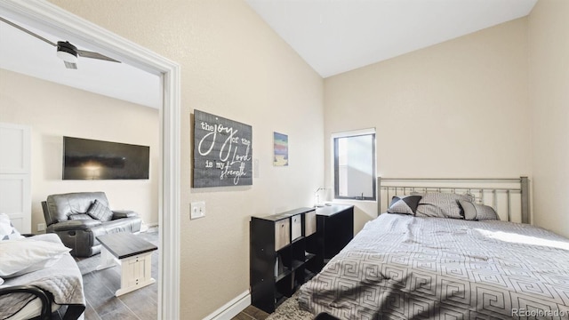 bedroom featuring vaulted ceiling