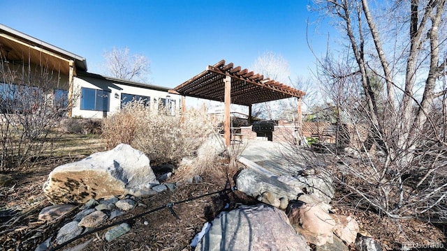 exterior space featuring a pergola