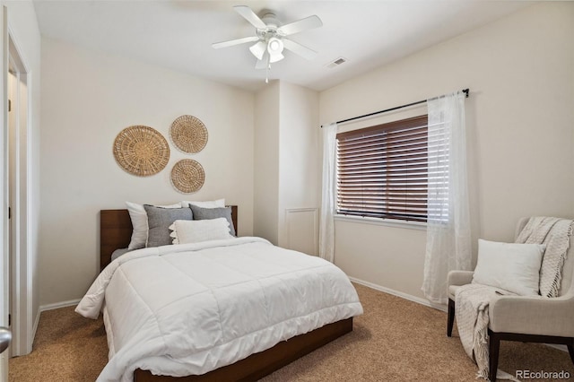 bedroom featuring carpet, visible vents, ceiling fan, and baseboards