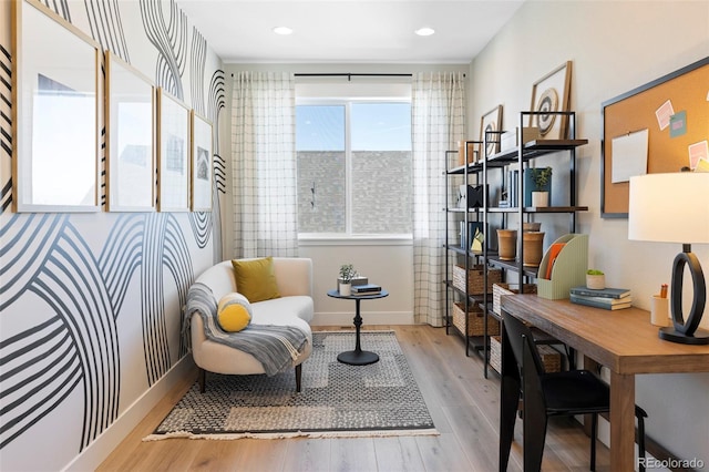 sitting room with light hardwood / wood-style floors