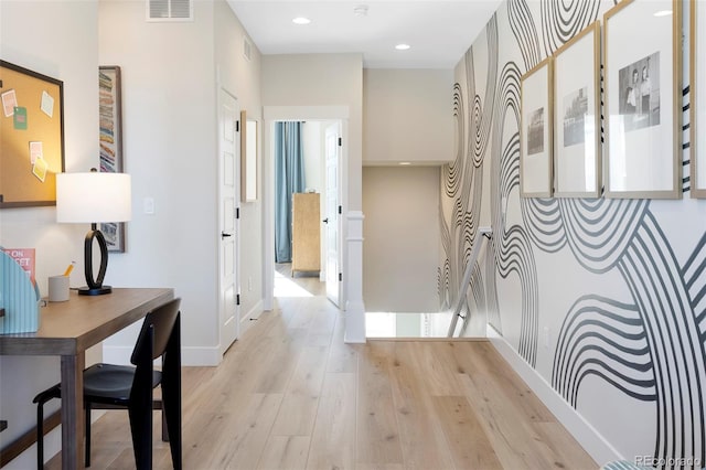 corridor featuring light hardwood / wood-style floors