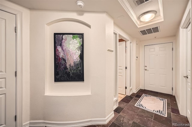 hallway featuring ornamental molding