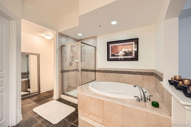 bathroom with tile patterned flooring and plus walk in shower