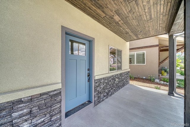 entrance to property with a patio area