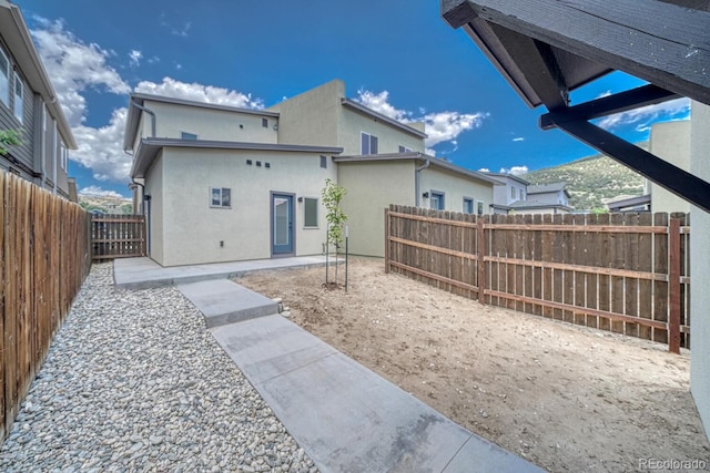 rear view of house with a patio