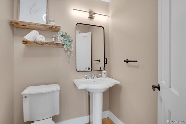 11776 Perry St, Westminster, CO 80031 - half bathroom with toilet and baseboards