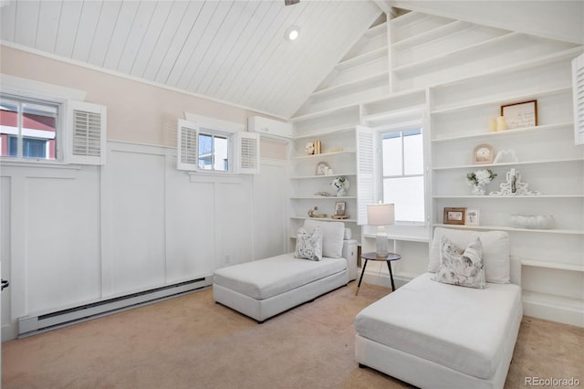 11776 Perry St, Westminster, CO 80031 - living area featuring a healthy amount of sunlight, baseboard heating, and carpet