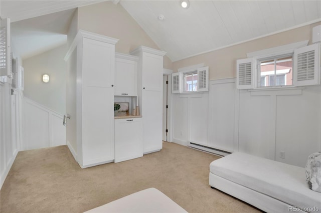 11776 Perry St, Westminster, CO 80031 - interior space featuring light colored carpet, a baseboard heating unit, multiple windows, and a decorative wall