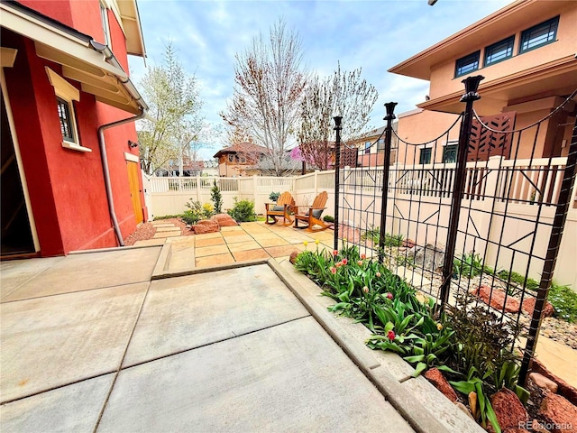 11776 Perry St, Westminster, CO 80031 - view of patio with a fenced backyard