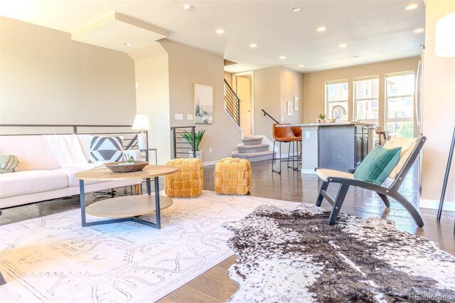 15738 E Broncos Pl, Englewood, CO 80112 - living room with recessed lighting, stairway, and wood finished floors