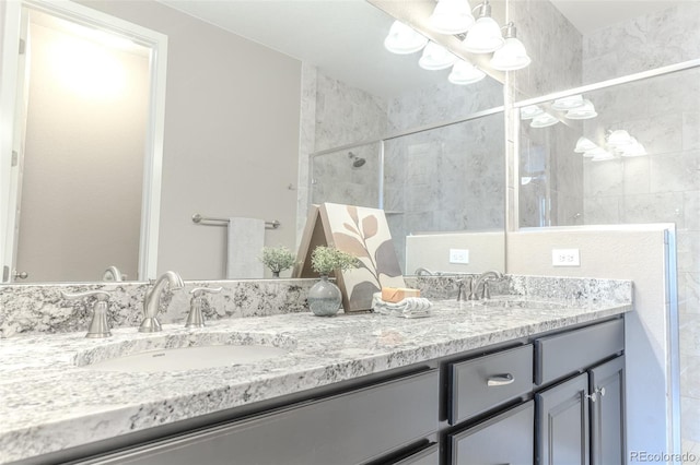 15738 E Broncos Pl, Englewood, CO 80112 - full bath with double vanity, a chandelier, and a tile shower