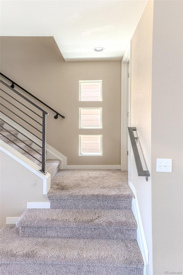15738 E Broncos Pl, Englewood, CO 80112 - stairway with carpet flooring and baseboards