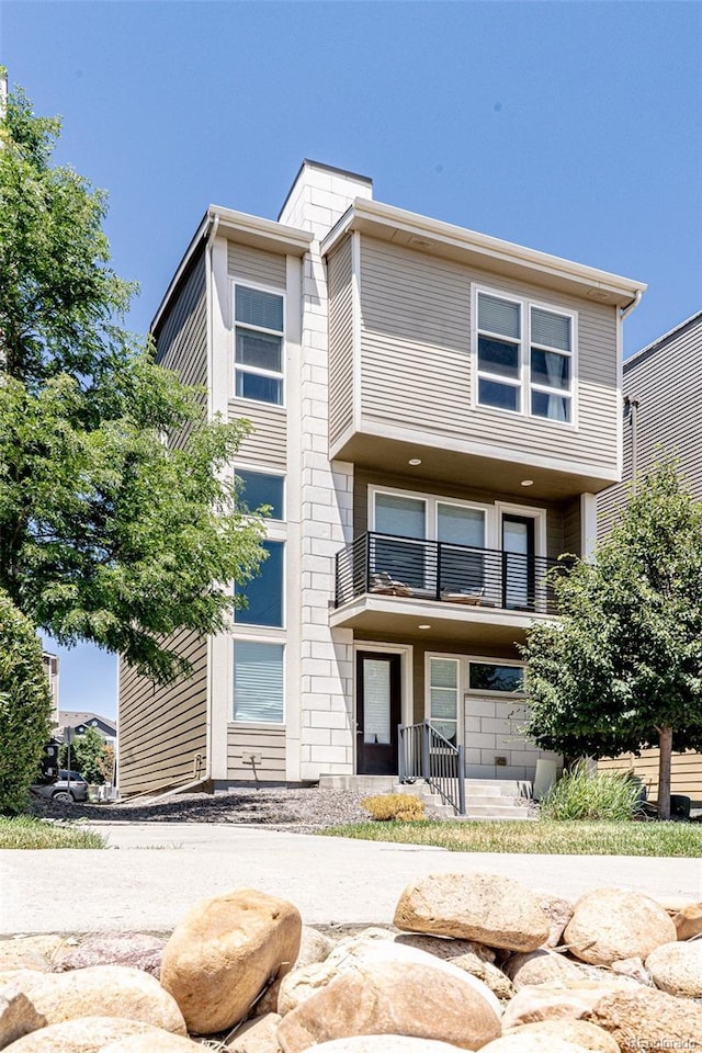 15738 E Broncos Pl, Englewood, CO 80112 - townhome / multi-family property with a balcony