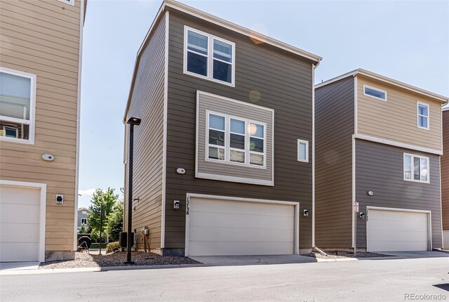 15738 E Broncos Pl, Englewood, CO 80112 - back of property with an attached garage