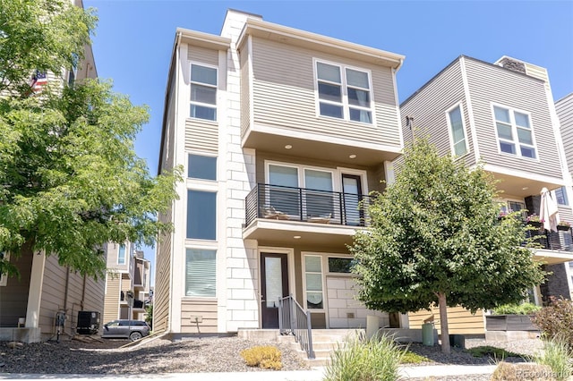15738 E Broncos Pl, Englewood, CO 80112 - view of property with a balcony