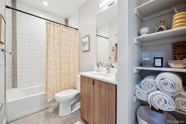 full bathroom featuring shower / tub combo with curtain, vanity, toilet, and tile patterned floors