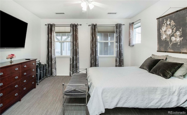 carpeted bedroom featuring ceiling fan