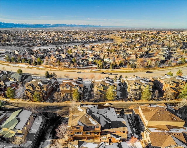 birds eye view of property featuring a mountain view